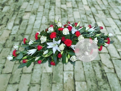 White lily with red and white roses and carnations coffin spray
