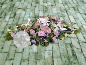 White lily with pink and lilac mixed flowers coffin spray