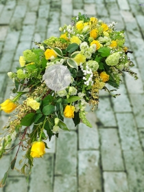 Large yellow and white casket spray