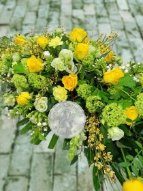 Large yellow and white casket spray